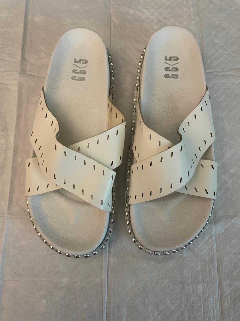 BCBG White Crisscross Slide Sandals with Studded Trim